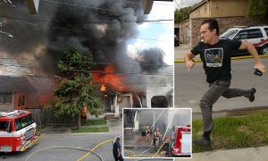 Power lines explode as firefighters work to extinguish a house fire Thursday, Sept. 15, 2016, in New Orleans, La. Writer and actor Gideon Hodge rushed into the structure ñ past firefighters yelling at him to stop ñ to grab his laptop, which he said had two completed novels on it. (Michael DeMocker/NOLA.com The Times-Picayune via AP)