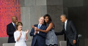 michelle-obama-and-george-w-bush-embrace