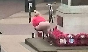 FILE PIC - Shocking picture of Kelly Martin urinating on a war memorial on the 100th anniversary of the battle of the Somme. See MASONS story MNWEE; Mother-of-five Kelly Martin to be sentenced at Basildon Magistrates Court for TWICE urinating on a war memorial - once on the 100th anniversary of the Somme.